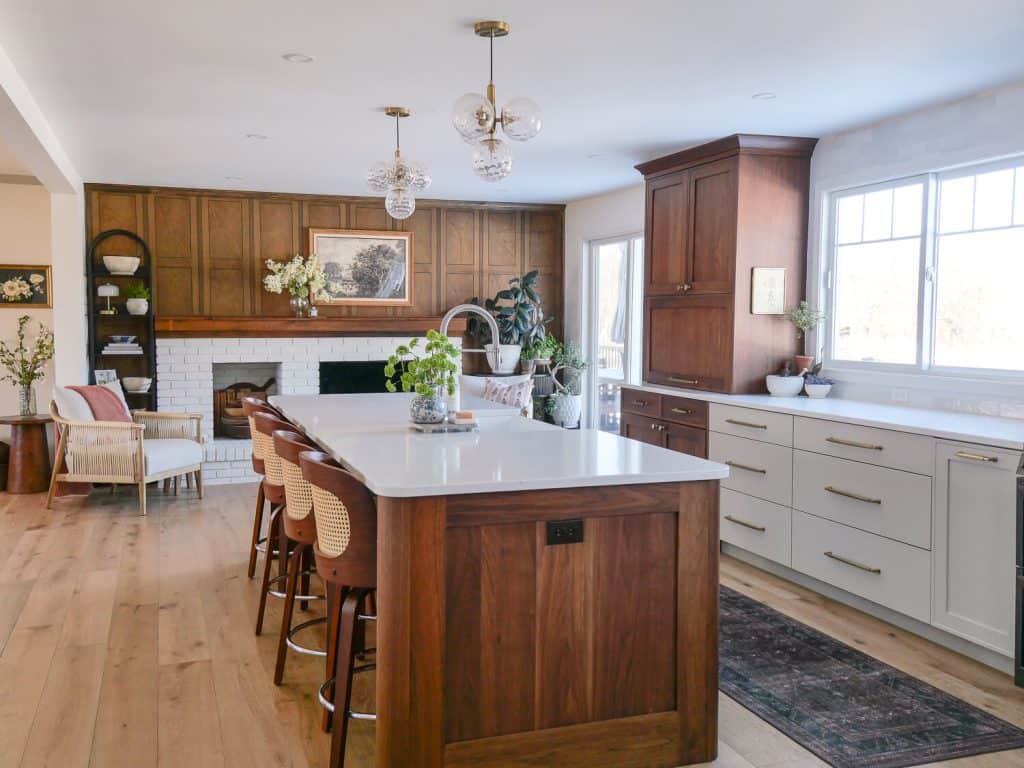 Walnut bar stools in a kitchen decorated for spring.