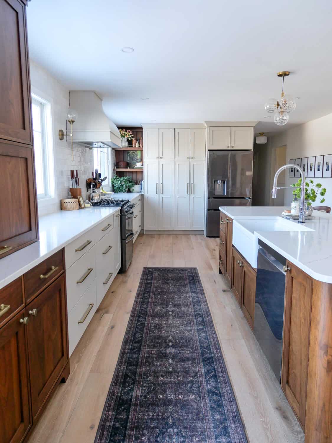 Wide view of a kitchen decorated for spring.