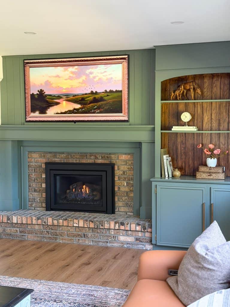 Finished brick fireplace makeover.