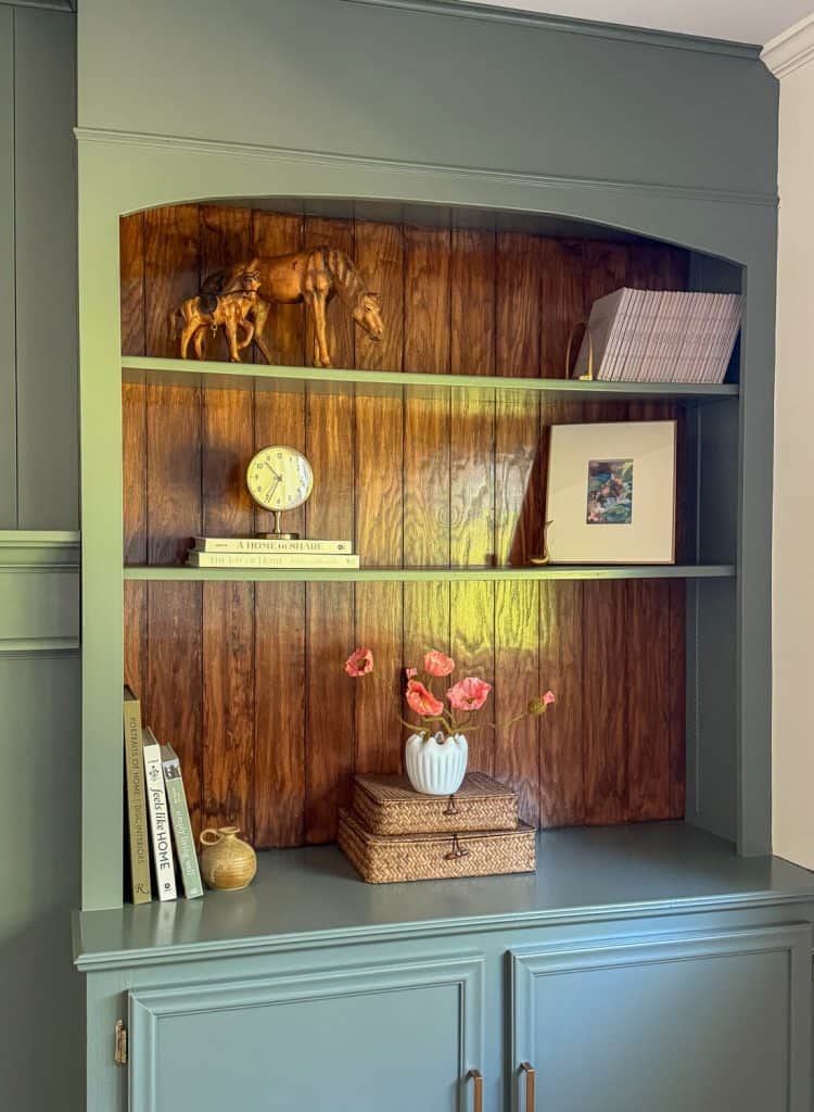 Updated built in cabinet with walnut paneling.