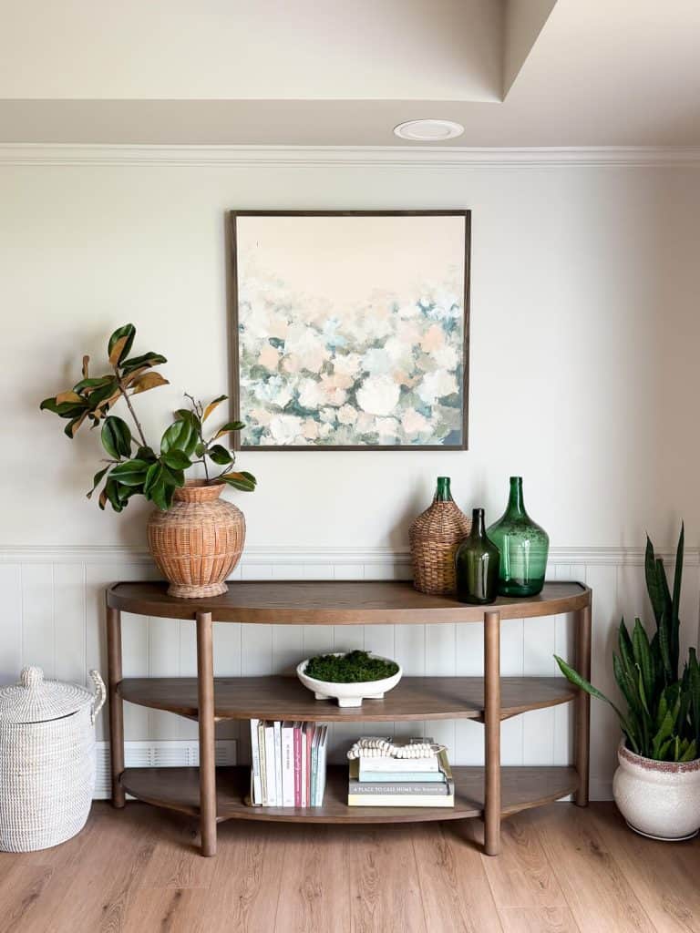 Console table decorated with antiques.